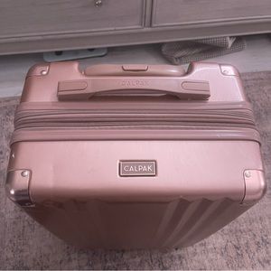 CALPAK Rose Gold Carry On